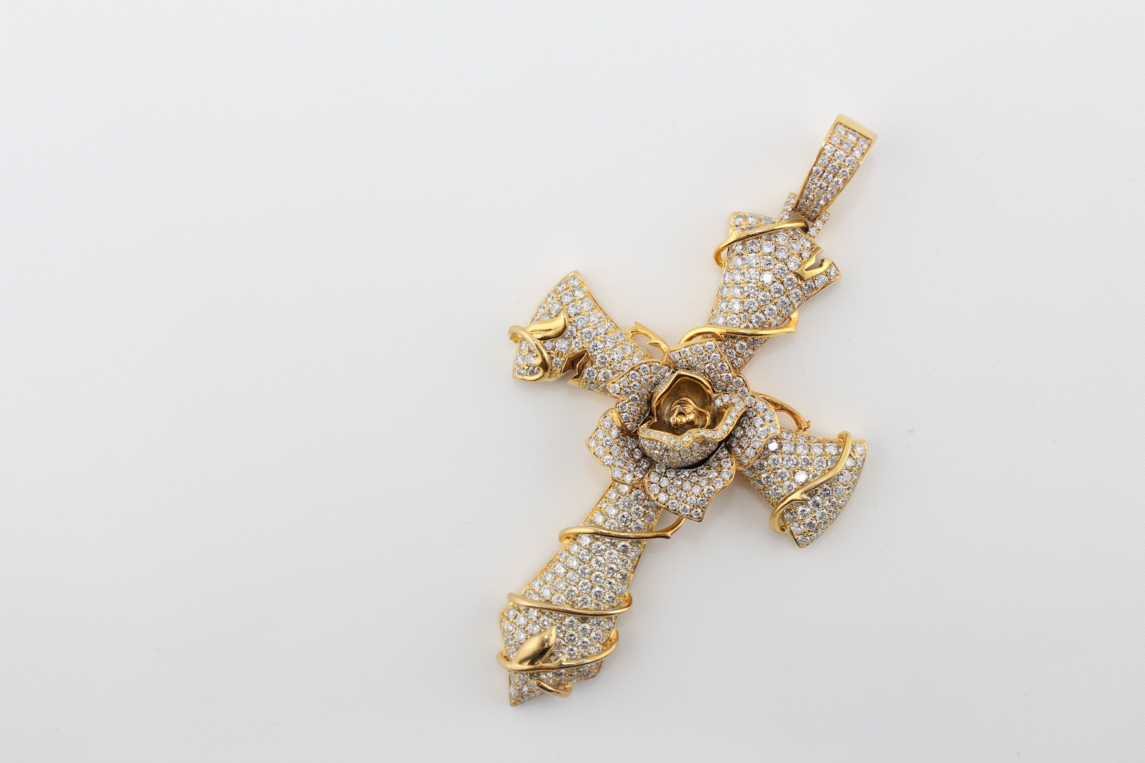 10k Gold and Diamond Cross with flower