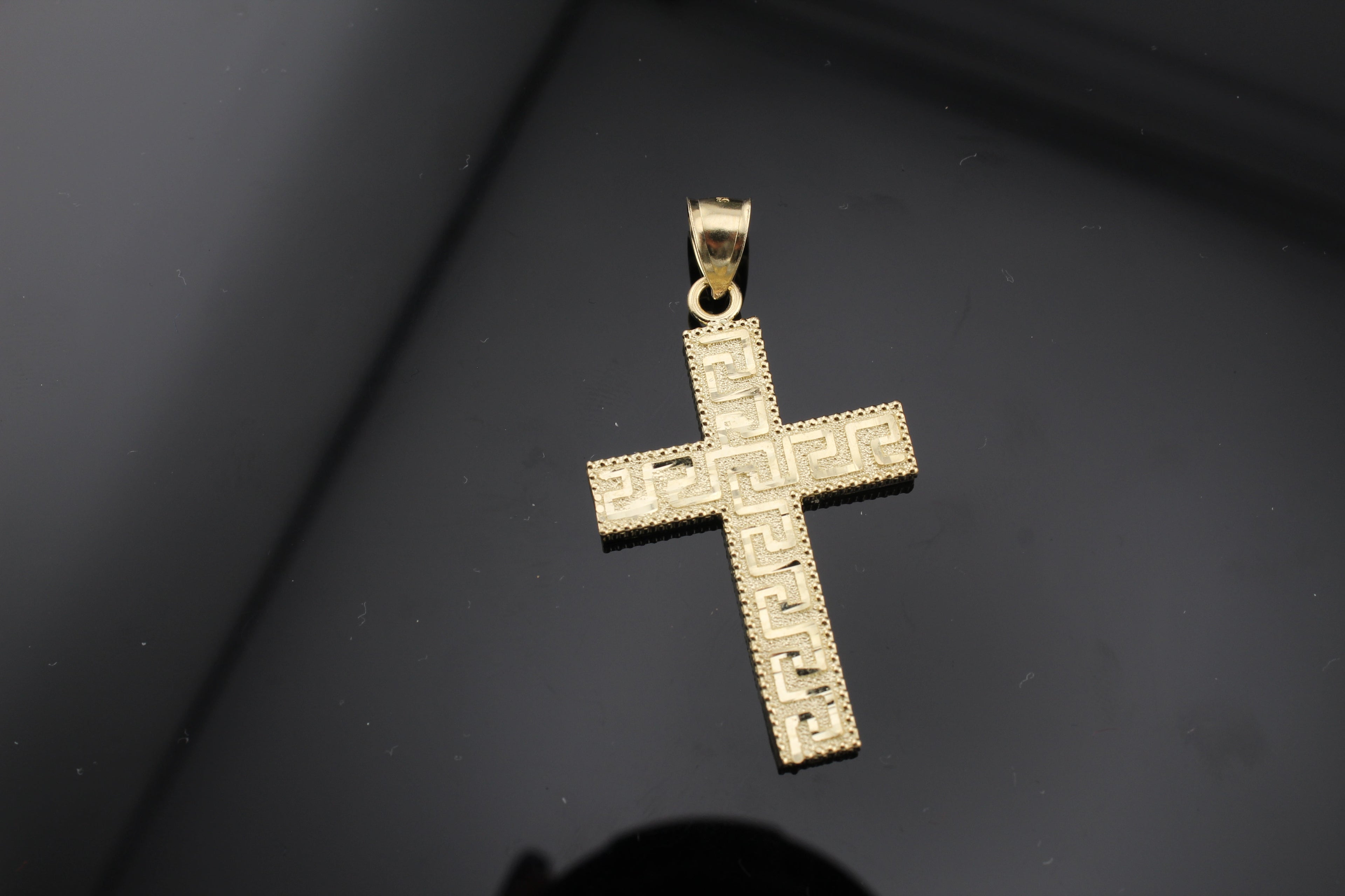 10k Gold Medussa patern cross